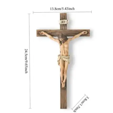 Croix en bois avec Jésus crucifié, symbole chrétien de la foi.