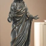 statue religieuse bronze avec des bras accueillants