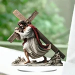 ornement de jésus 2D portant la croix vue près