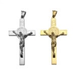 Croix d'aube en acier et or avec Jésus crucifié.